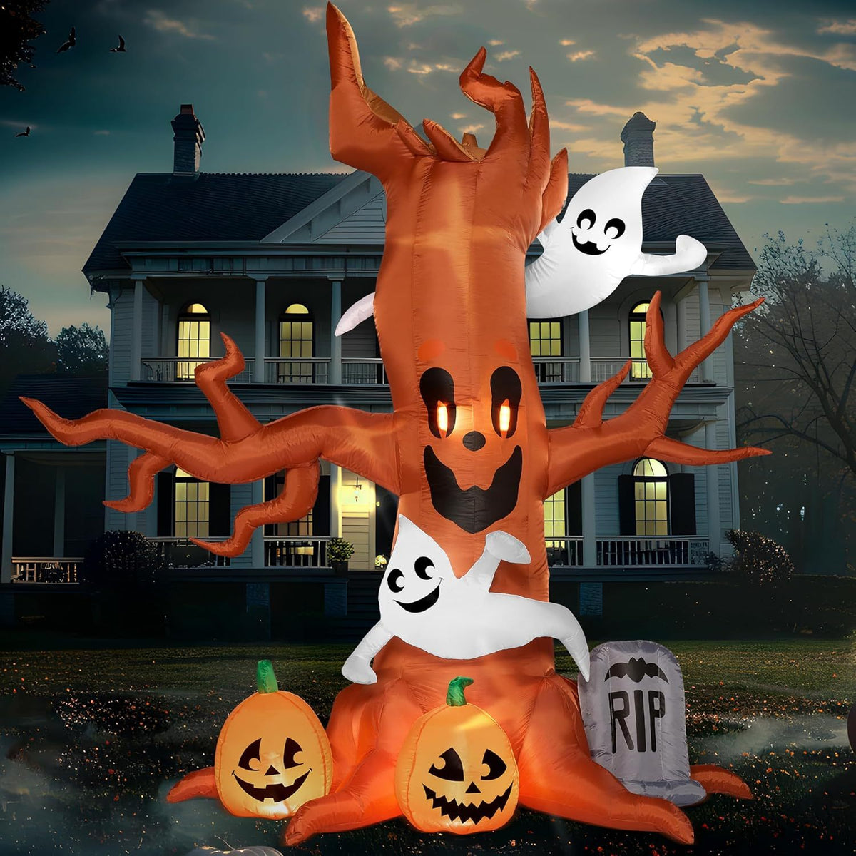 Tombstone figure at the base of the inflatable Halloween tree