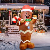 Gingerbread man blow up holding candy canes