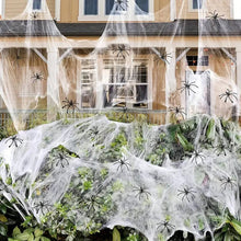 Close-up of fake spiders included with the Halloween spider web decoration