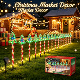Color changing garden stake lights arranged along a planting border