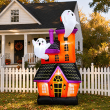 Large inflatable haunted house ghost castle decoration lit up in a yard - view 2