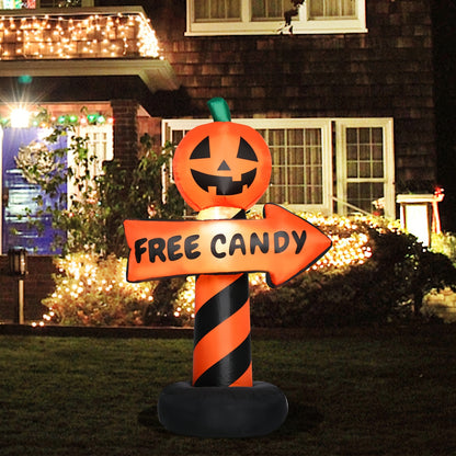 Inflatable pumpkin road sign lit up with LED lighting at night