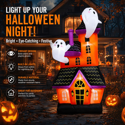Large inflatable haunted house ghost castle decoration lit up in a yard - view 4