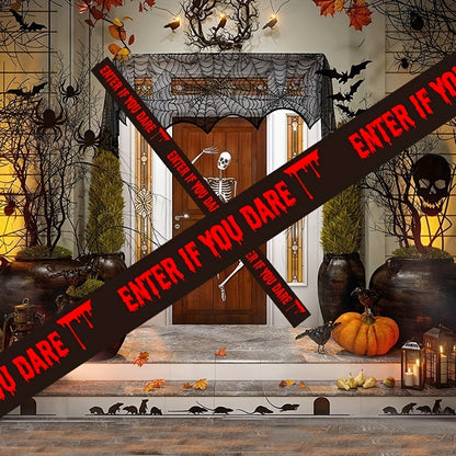 Two rolls of black and red Halloween caution tape