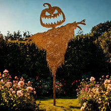 Rustic iron pumpkin scarecrow decoration with a jagged grin