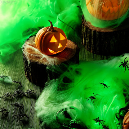 Stretched glow in the dark spider web fiber pulled thin across a corner