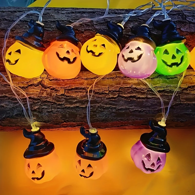 Pumpkin string lights hung along a window frame