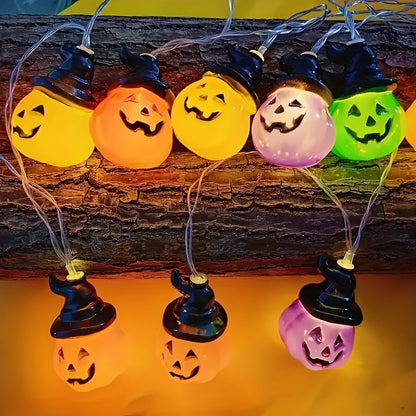 Pumpkin string lights hung along a window frame