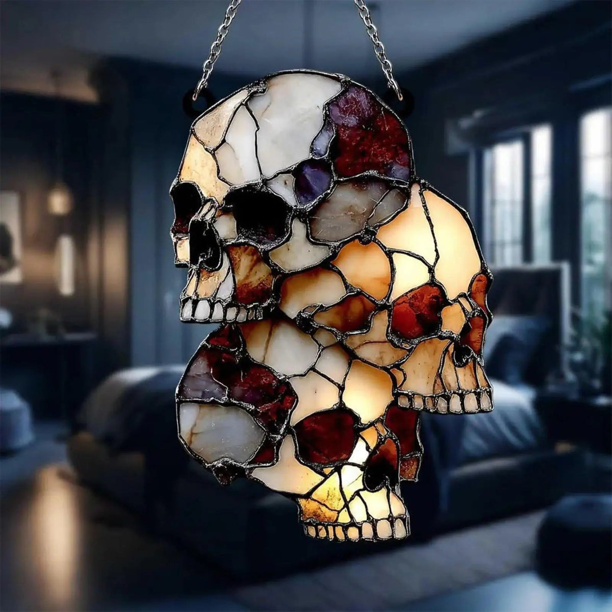 Close-up of a single acrylic skull in the hanging Halloween decoration