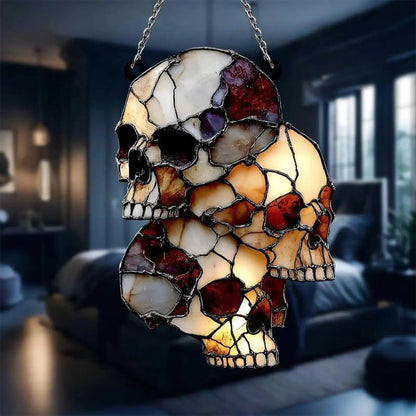 Close-up of a single acrylic skull in the hanging Halloween decoration