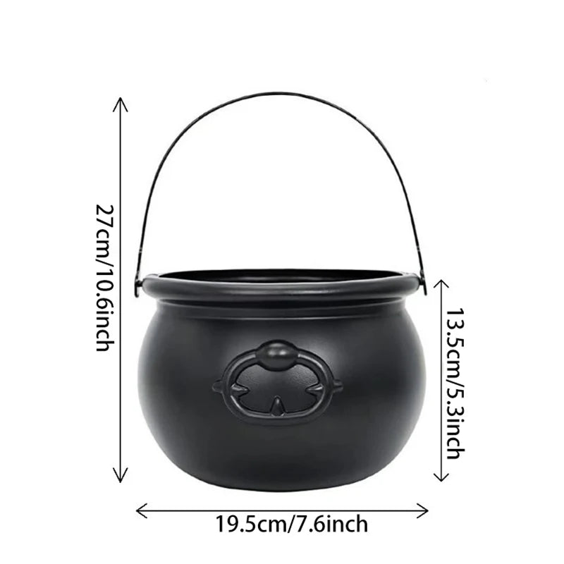 Witch cauldron candy bowl filled with wrapped candy