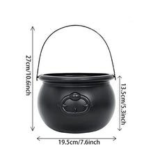 Witch cauldron candy bowl filled with wrapped candy