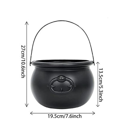 Witch cauldron candy bowl filled with wrapped candy