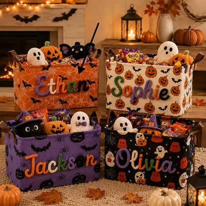 Close-up of embroidered name and pumpkin ghost bat pattern on storage basket