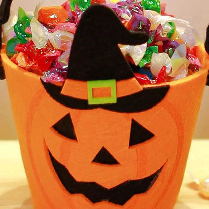 Halloween treat bags with seasonal candy bucket designs