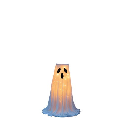 Ghost candy bowl stand placed at a front door
