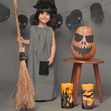 Halloween flameless candle with witch silhouette design