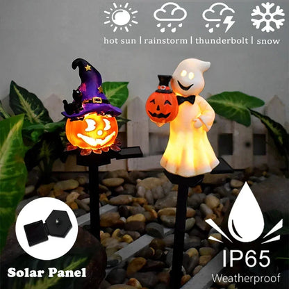 Halloween solar light ghost design staked in a yard