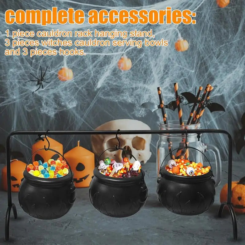 Witch cauldron candy bowl set displayed on a party table