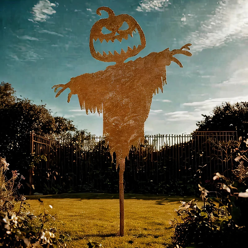 Weathered rustic finish on an iron pumpkin scarecrow figure