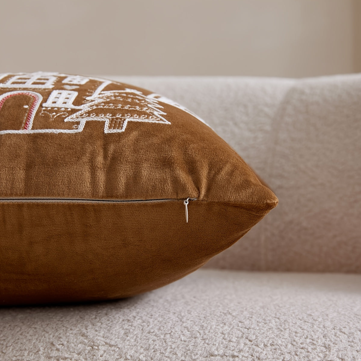 Flannel Christmas cushion cover with stitched holiday motifs