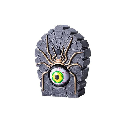 Close-up of the spider eyeball doorbell button