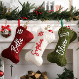 Hanging Christmas stocking by a fireplace
