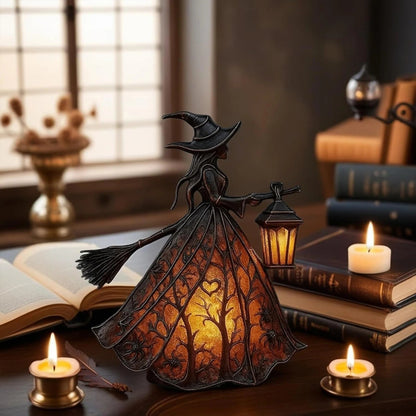 Halloween witch table lamp displayed on a desk