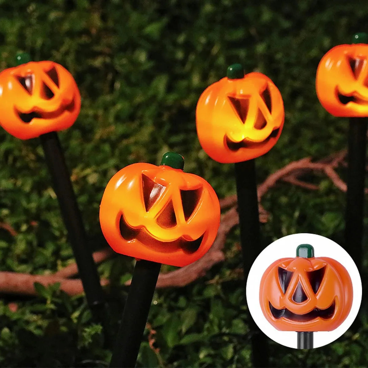 Solar pumpkin and ghost Halloween decor set glowing at night