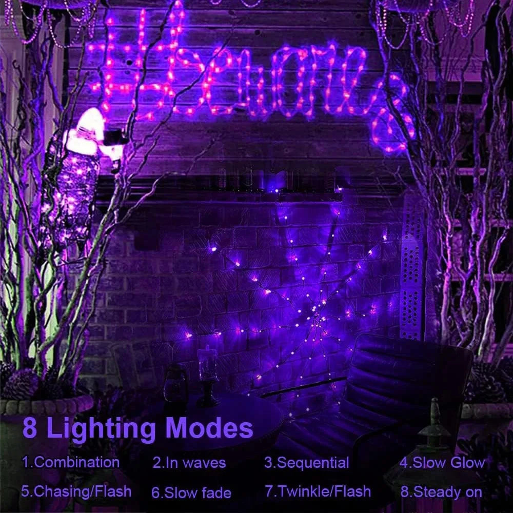 LED spider web decoration hanging in a doorway
