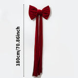 Red bow used as a photo backdrop decoration