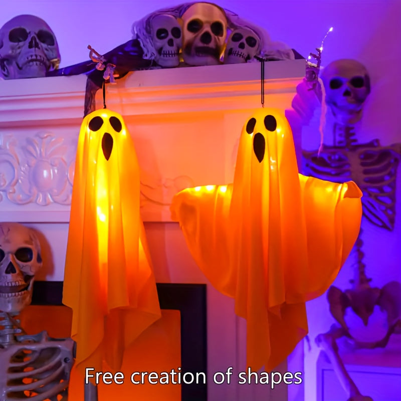 Hanging ghosts used as indoor Halloween decor