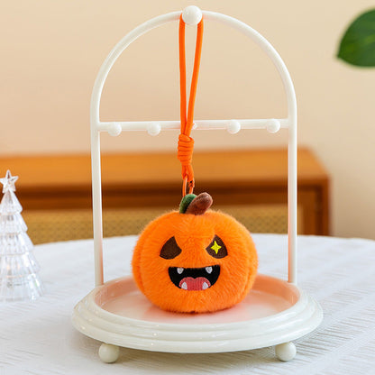 Single pumpkin plush keychain shown at full size