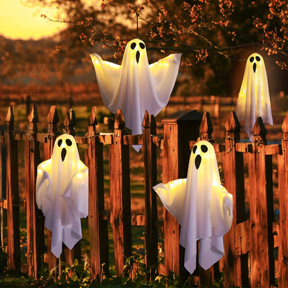 Hanging ghost suspended from a tree branch