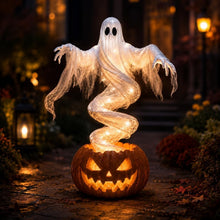 Vinyl pumpkin and ghost Halloween ground decoration placed on a lawn