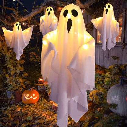 Hanging Halloween lighted ghost decoration glowing at night
