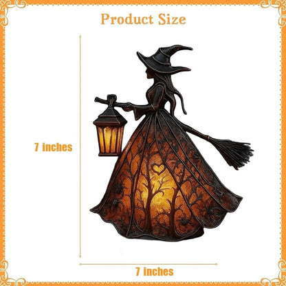 Halloween witch table lamp glowing in a dark room