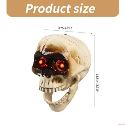 Animated Halloween skeleton head displayed outdoors on a porch