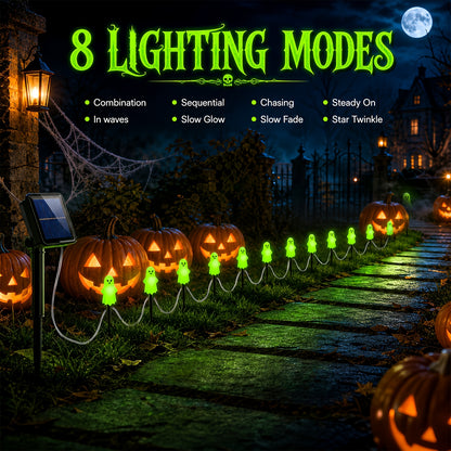 Solar ground stake lights glowing at night along path