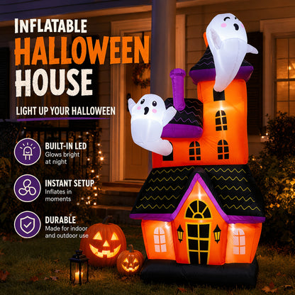 Large inflatable haunted house ghost castle decoration lit up in a yard - view 7