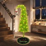 Bendable Christmas tree hung with Christmas balls