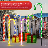 Candy cane pathway light showing the ground stake spike