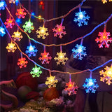Close view of a single plastic snowflake on the light string