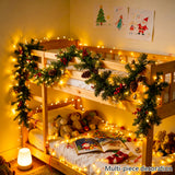 Spruce garland wrapped around a stair bannister