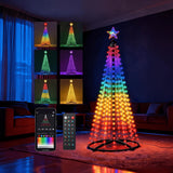 Outdoor lighted Christmas tree glowing in color at night