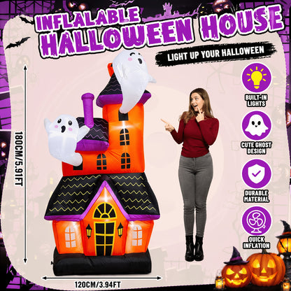 Large inflatable haunted house ghost castle decoration lit up in a yard - view 3