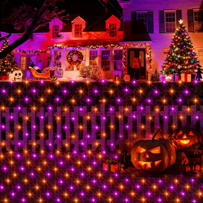 Orange and purple LED solar net lights draped over outdoor bushes for Halloween - view 5