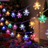 Snowflake light string draped along a mantel