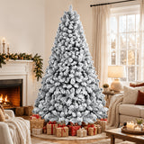 Flocked artificial Christmas tree with warm lights for a living room