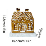 Resin gingerbread house incense holder for a shelf